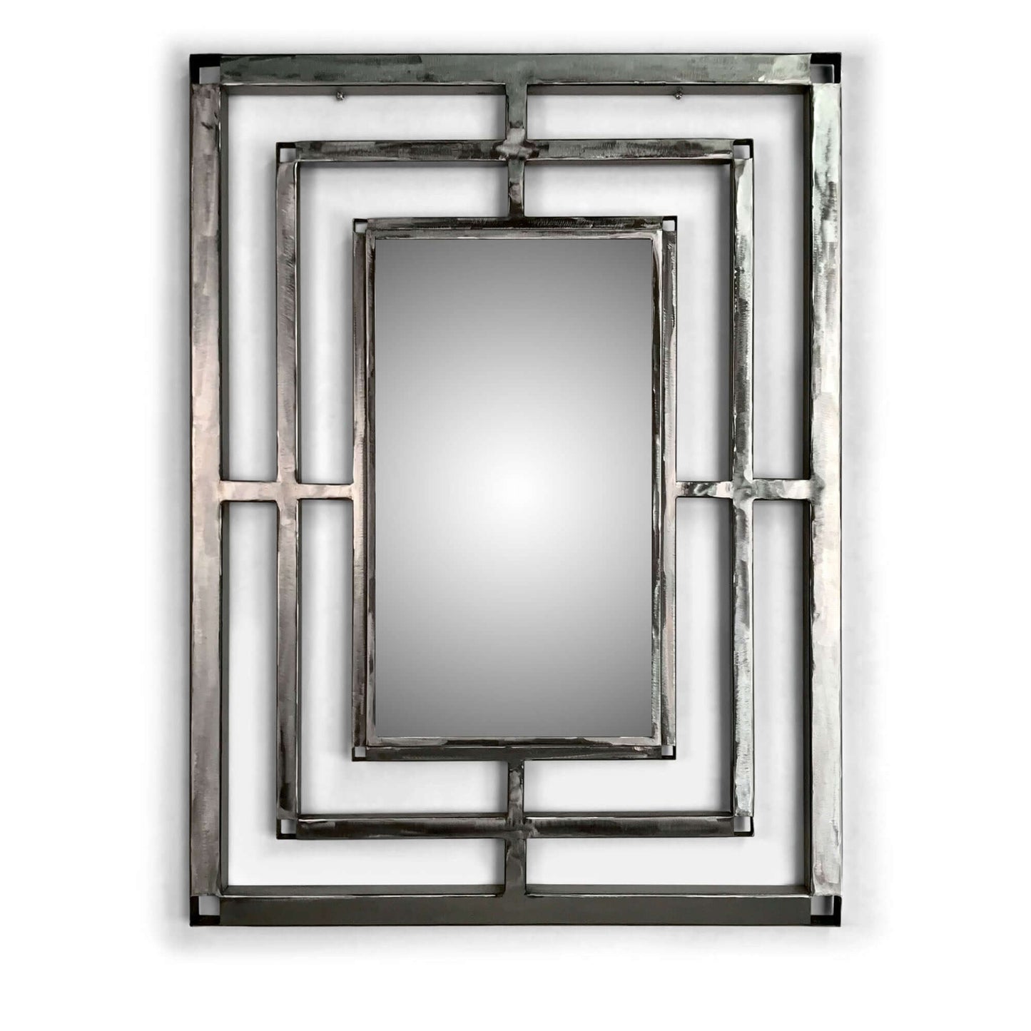 Art deco brushed metal mirror close up